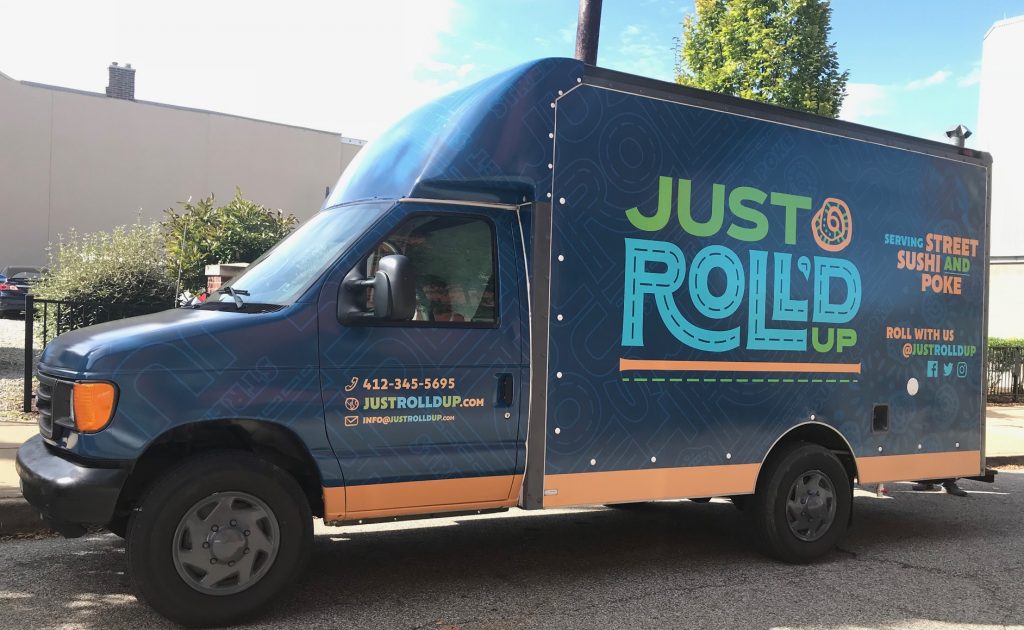 Just Roll'd Up vehicle wrap